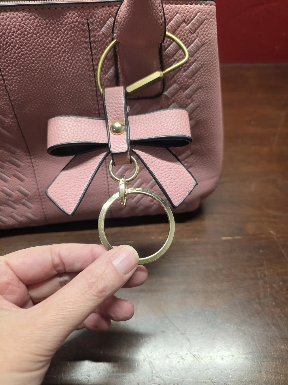 Chic Pink Satchel with Bow Charm and Gold Accents - Picture 5 of 8
